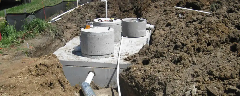 Septic system repair and installation site with tank access ports in Scottsdale, AZ